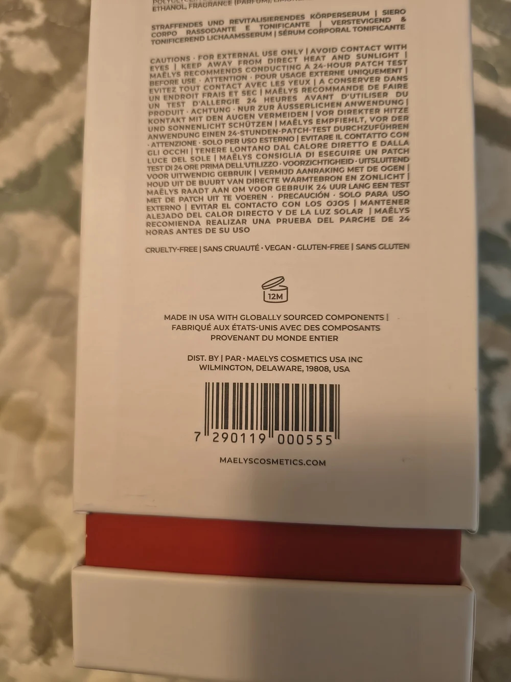 MAËLYS RE-LURE Tight & Tone Body Serum - White with Red Accents